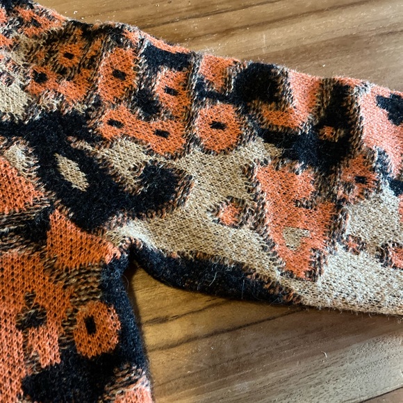 CHANEL Black and Orange Crew Neck Sweaters with Cozy Texture - Picture 6 of 8